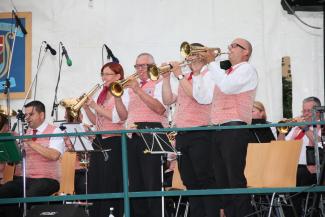 Ds Flügelhornregister vom Musikverein Leopoldau bei einer Solostelle.