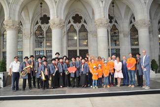 Gesamtfoto mit Orange Corporation und Musikverein Leopoldau.